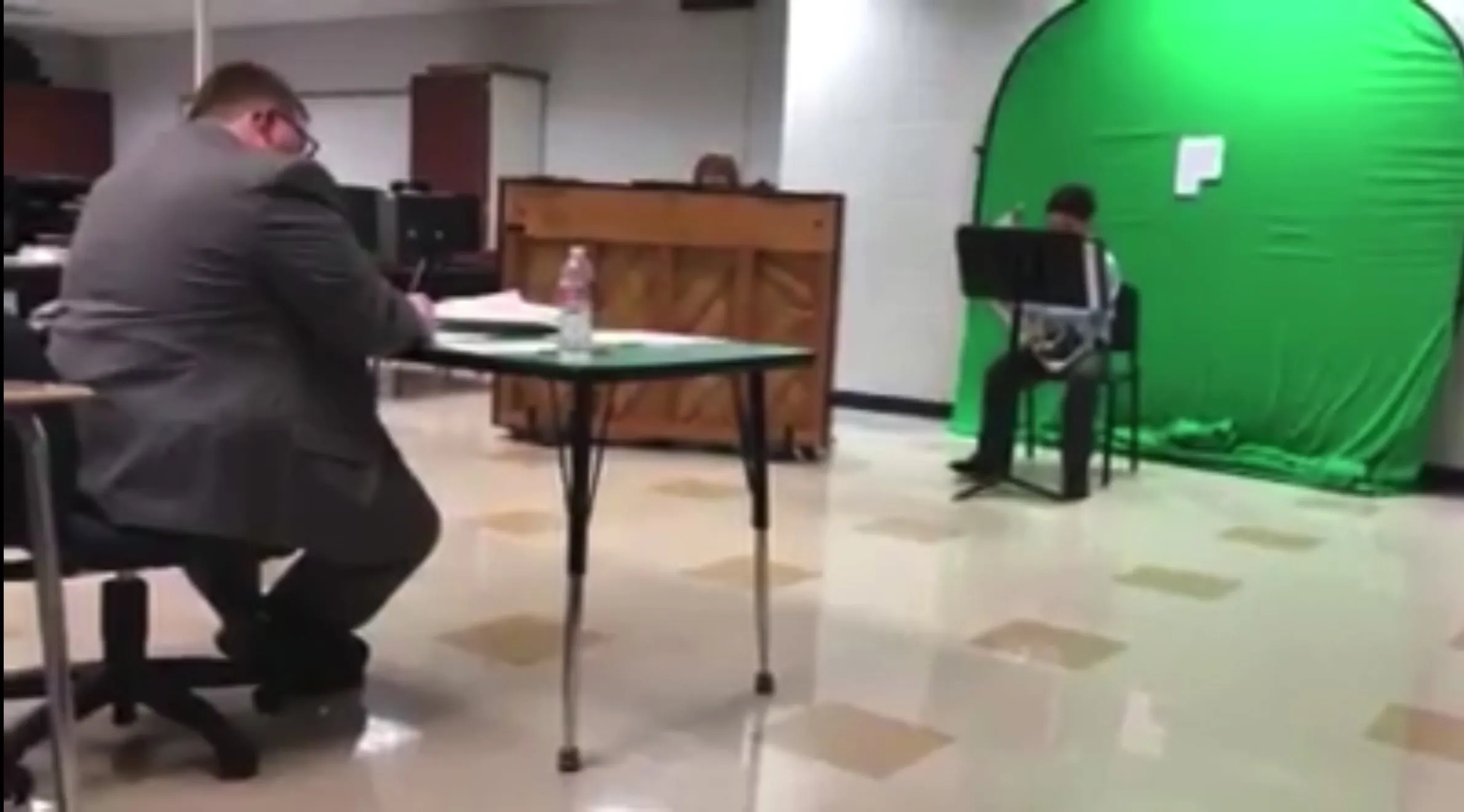Miguel performing a euphonium solo at a school contest in 7th grade